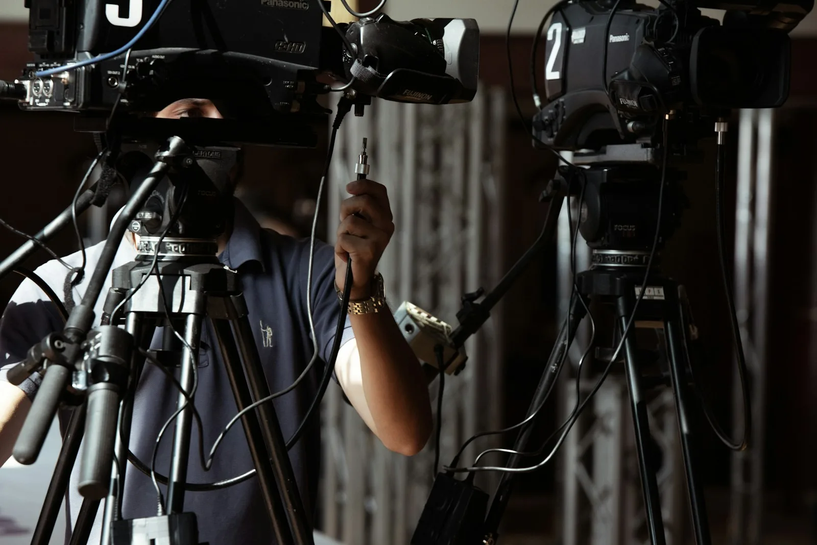 shallow focus photo of black video camera